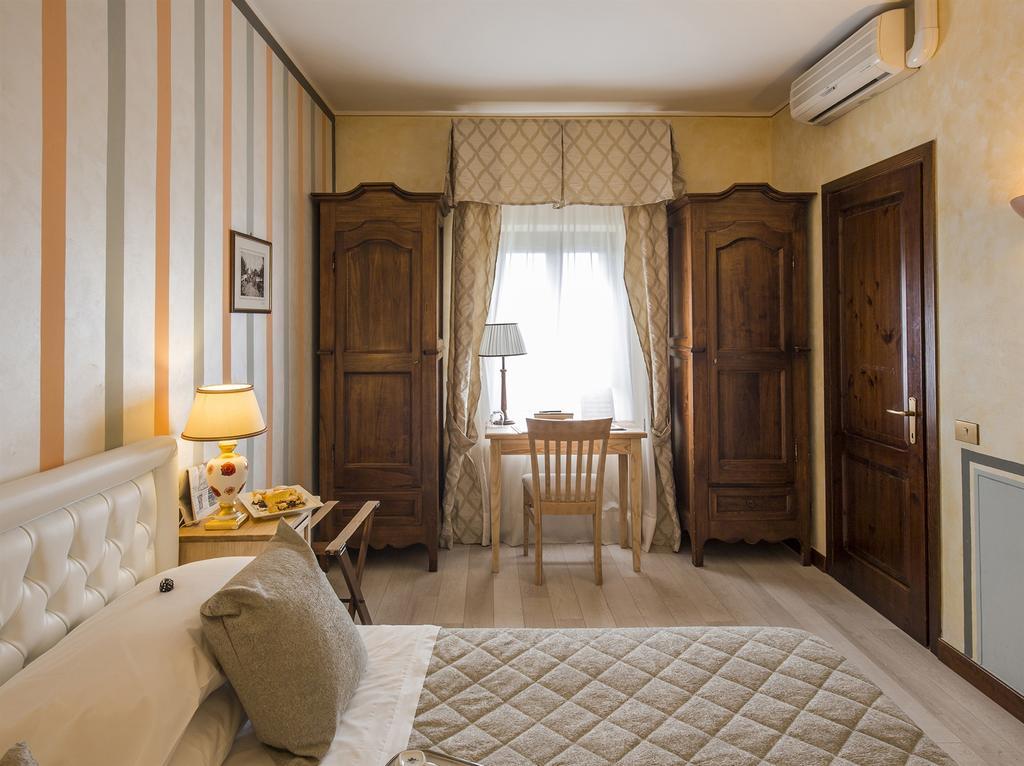 Il Melograno Agriturismo & Spa Pianello  Pokoj fotografie